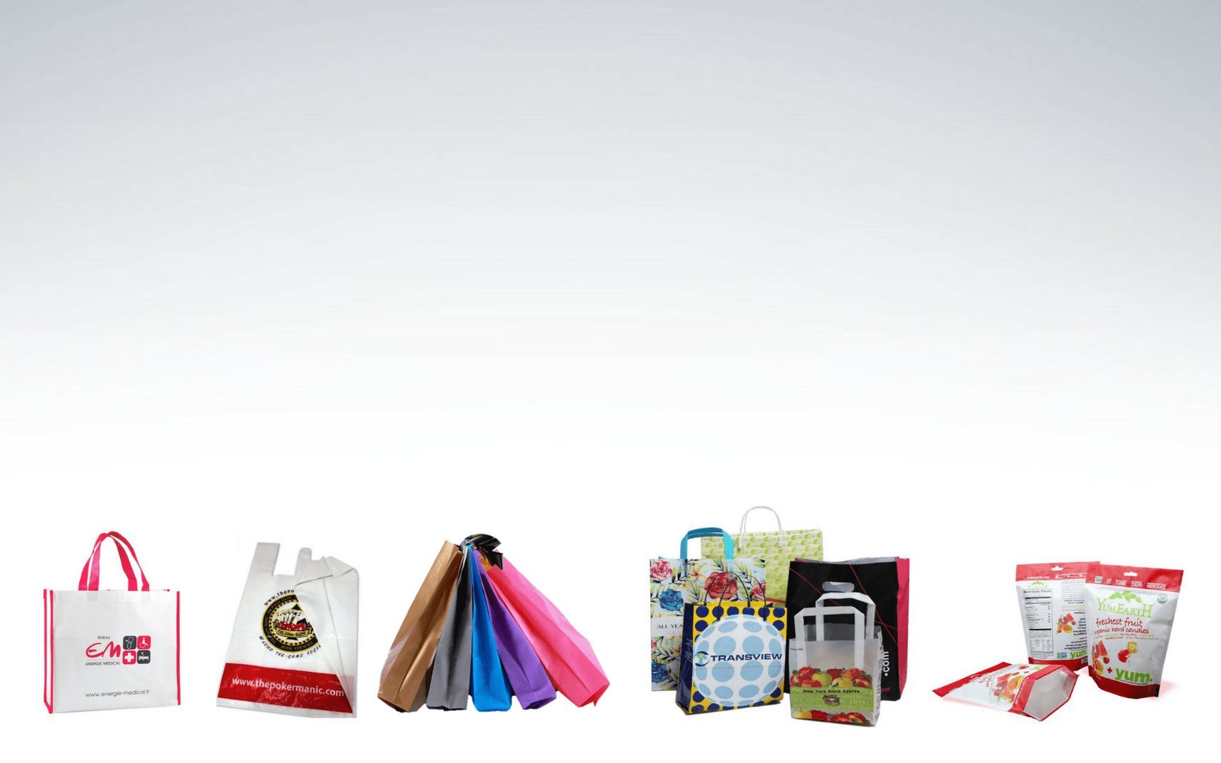 A collection of various retail bags and pouches displayed against a white background. Includes tote bags with handles, gusseted pouches with resealable closures, and flat bags with printed graphics.