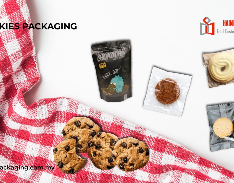 A collection of various cookie packages and loose cookies arranged on a white surface with a red and white checkered cloth.