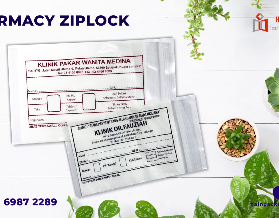 Two clear ziplock bags with printed medical information, one on top of the other, against a white wooden background with potted succulents and greenery.