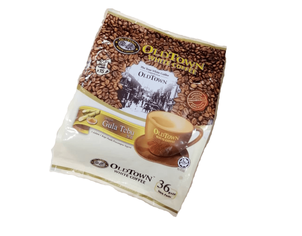 The picture shows a bag of Old Town White Coffee. The bag is made of a brown and white material, and it features a coffee bean pattern on