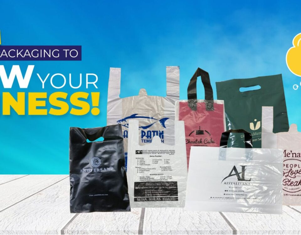 A collection of various plastic shopping bags with handles, displaying different colors, graphics, and printed text, arranged on a wooden surface against a blue sky background.