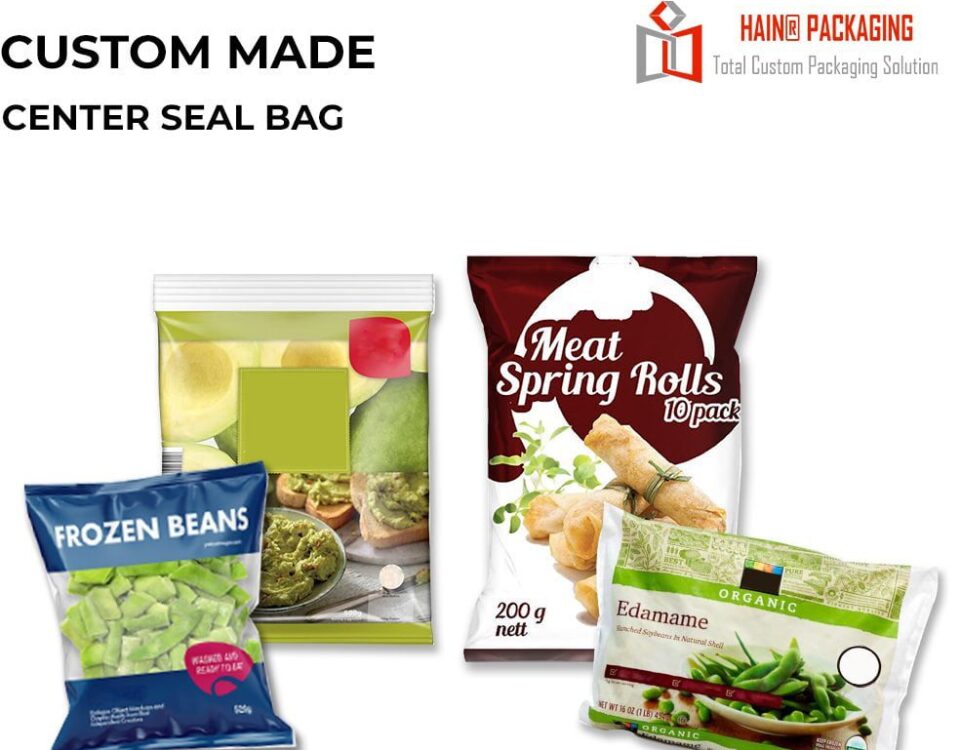 Four different food packages are displayed. One is a dark blue bag labeled 'FROZEN BEANS'. Next to it is a clear bag with a green and white design showing avocado and toast. A dark red bag is labeled 'Meat Spring Rolls 10 pack'. In front of that is a white bag with green accents labeled 'ORGANIC Edamame'.
