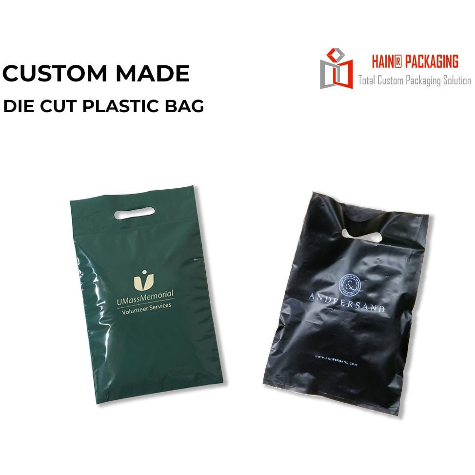 Two custom die-cut plastic bags, one dark green with white text and logo, the other black with white text and logo, displayed against a white background.