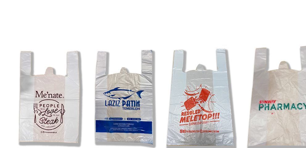 Four white singlet plastic bags with handles, each featuring different custom printing. The first bag has a brown graphic and text. The second bag has a blue fish graphic and text. The third bag has red graphics and text. The fourth bag has green text.