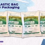 Four white bags of fertilizer are displayed, each featuring a green and yellow landscape graphic at the top and prominent text indicating "SUPERB agrofertilizer" and "10kg NPK".