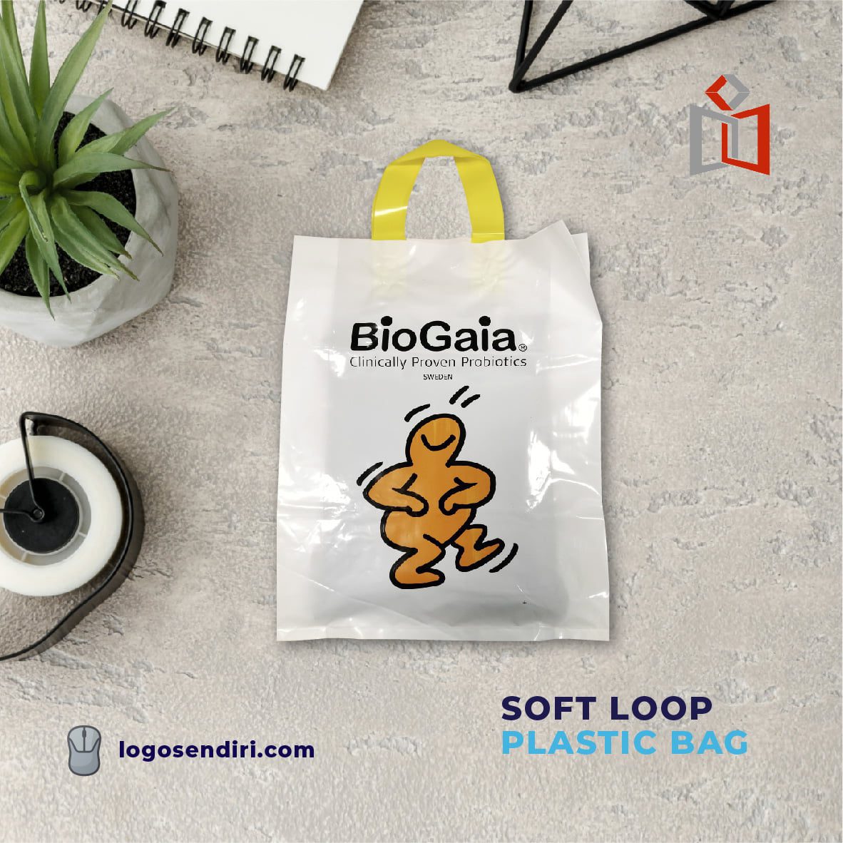 Soft loop plastic bag with branding showing where the loop weld sits inside the printable panel