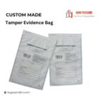 Two white, rectangular tamper-evident security bags with printed text and fields for recipient and sender information.