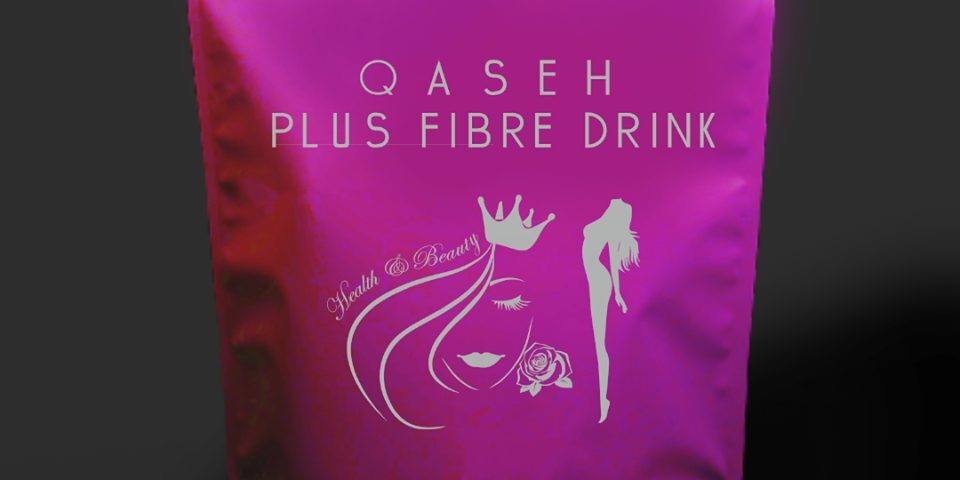 A magenta stand-up pouch with a resealable top, featuring white text and graphics. The text reads 'QASEH PLUS FIBRE DRINK' and 'LEMON TEA FLAVOUR'. Graphics include a stylized woman's face with a crown and rose, and a silhouette of a woman.